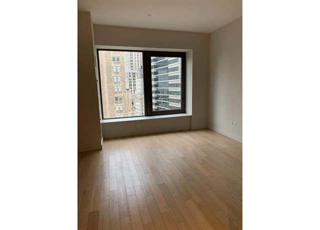 Property at 75 Wall St Unit 31J, New York City, NY 10005, 1 bath