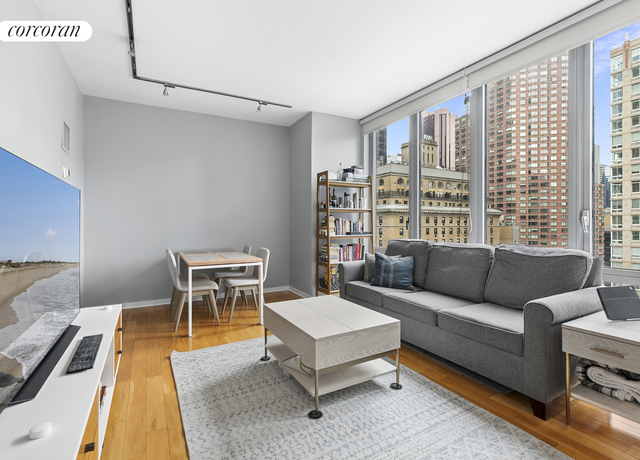 Property at 310 W 52nd St Unit 15A, New York City, NY 10019, 1 bed, 1.5 baths