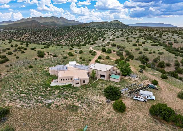 Property at 115 Waldo Mesa, Madrid, NM 87010, 3 beds, 3 baths