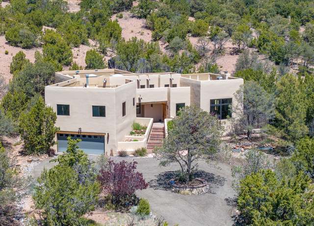 Property at 1052 Camino Real, Santa Fe, NM 87501, 4 beds, 2 baths