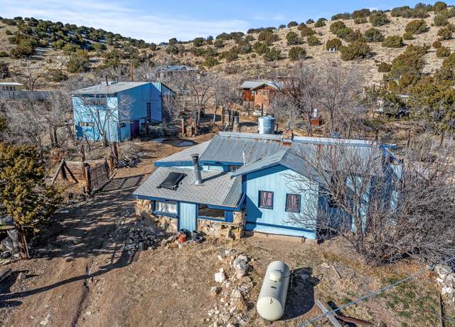 Property at 2 Grasshopper Rd, Madrid, NM 87010, 2 beds, 2 baths