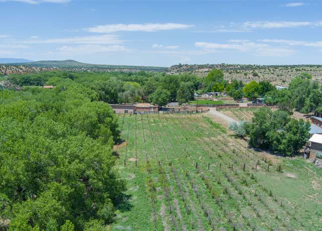 Property at 442 Los Pinos Rd, NM 87507, 7 beds, 4 baths
