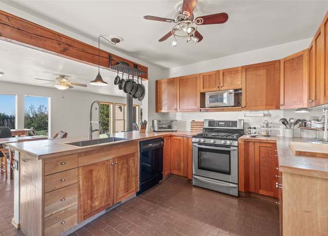 Property at 24 Camerada Rd, Santa Fe, NM 87508, 3 beds, 2 baths