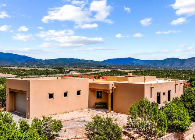 Property at 2077 Pinon Bluffs Dr, Santa Fe, NM 87506, 3 beds, 2 baths
