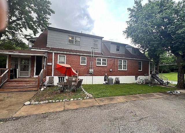 Property at 2409 Spencer Ave, Overland, MO 63114, 5 beds, 3 baths