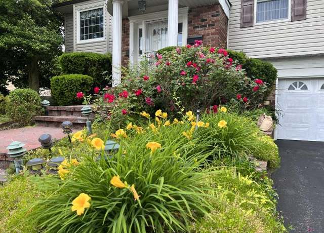 Property at 15 Meleny Rd, Locust Valley, NY 11560, 4 beds, 3 baths