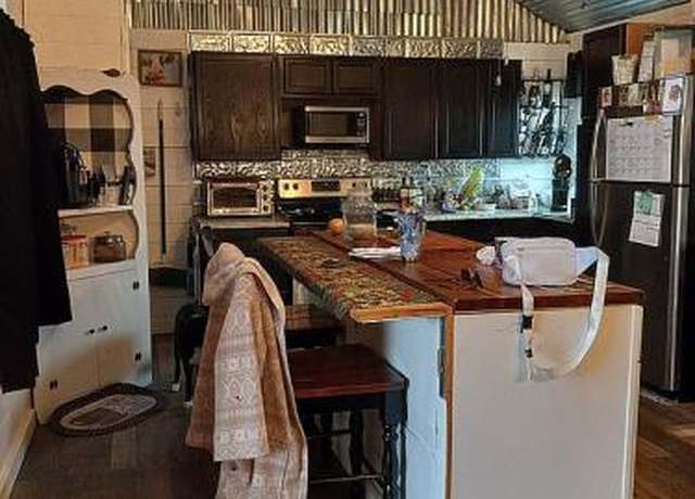 Property at 402 W Pecan St, Johnson City, TX 78636, 4 beds, 2 baths