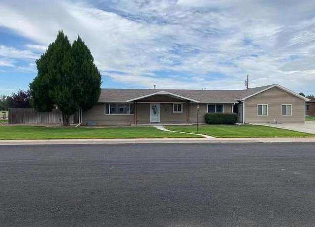 Property at 912 W 6th Ave, Yuma, CO 80759, 4 beds, 3 baths