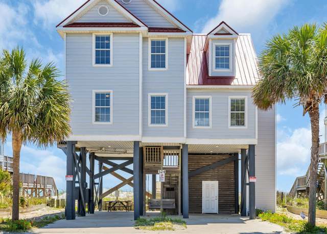 Property at 324 S Waccamaw Dr, Garden City Beach, SC 29576, 4 beds, 3 baths