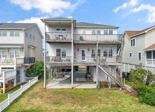 Property at 48 SW Wilmington St, Ocean Isle Beach, NC 28469, 5 beds, 5 baths
