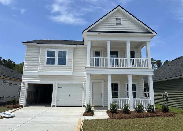Property at 3338 SW Wood Stork Dr, Ocean Isle Beach, NC 28469, 5 beds, 3.5 baths