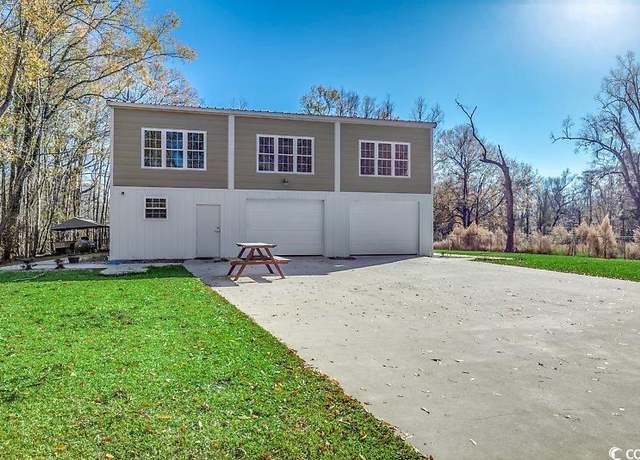 Property at 7018 Cox Lake Ct, Mullins, SC 29574, 4 beds, 3 baths