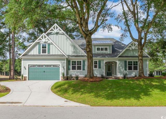 Property at 394 Sea Trail Dr W, Sunset Beach, NC 28468, 4 beds, 3 baths