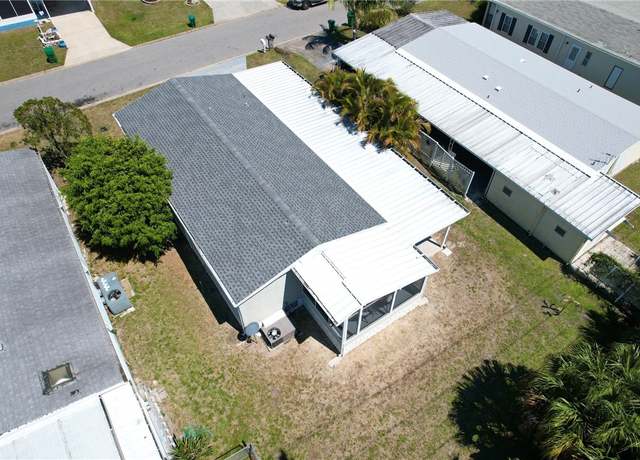 Property at 831 Vireo Dr, Barefoot Bay, FL 32976, 3 beds, 2 baths