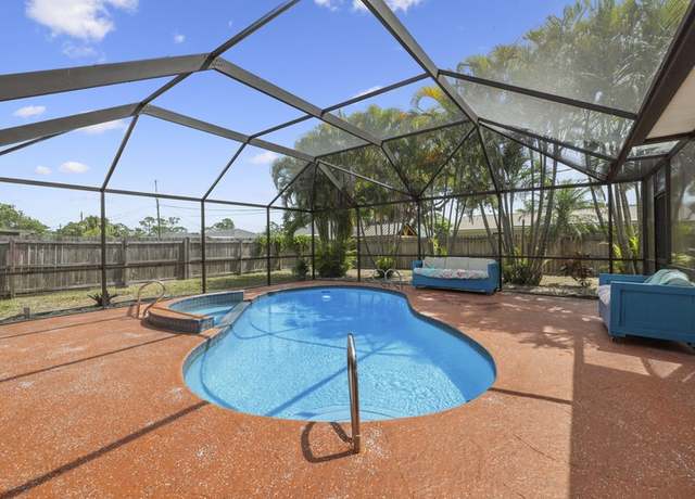 Property at 1255 Jenkin Ave NE, Palm Bay, FL 32907, 4 beds, 2 baths