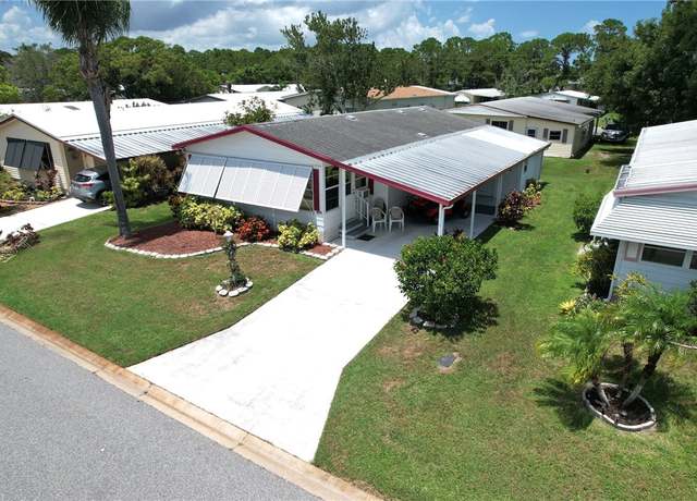 Property at 1070 Manila Dr, Barefoot Bay, FL 32976, 2 beds, 2 baths