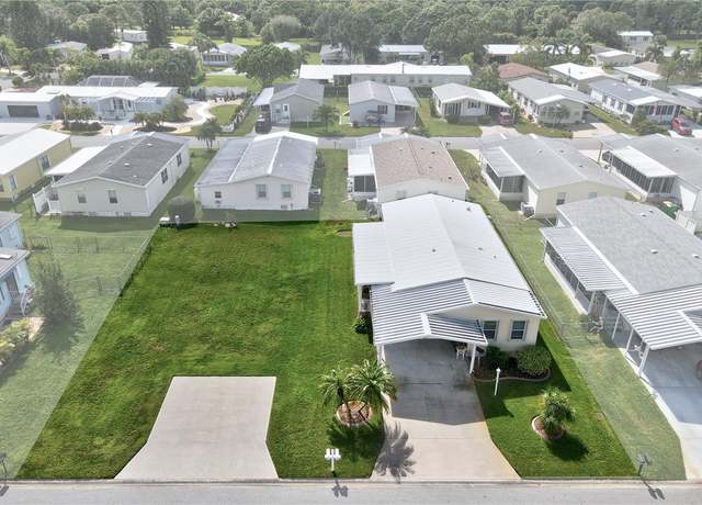 Property at 835 Sapodilla Dr, Barefoot Bay, FL 32976, 2 beds, 2 baths