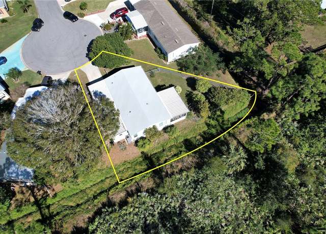 Property at 208 Calico Ct, Barefoot Bay, FL 32976, 2 beds, 2 baths
