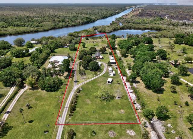 Property at 9556 Fleming Grant Rd, Micco, FL 32976, 4 beds, 2 baths