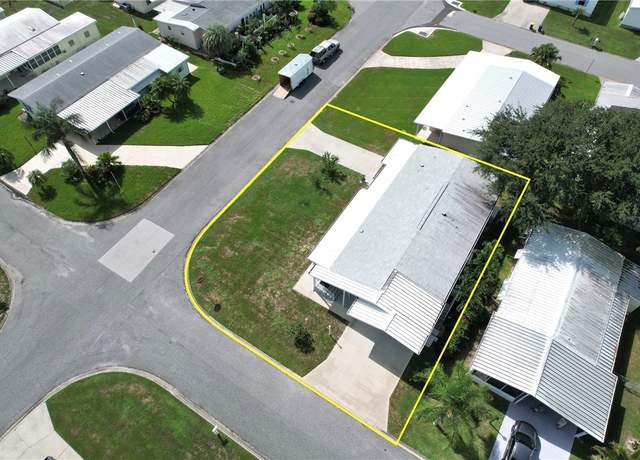 Property at 401 Loquat Dr, Barefoot Bay, FL 32976, 2 beds, 2 baths