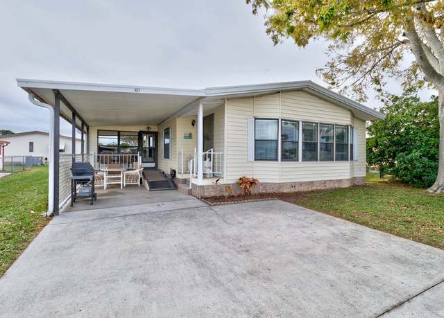 Property at 921 Dogwood Dr, Barefoot Bay, FL 32976, 2 beds, 2 baths