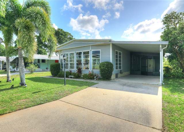 Property at 710 Hyacinth Cir, Barefoot Bay, FL 32976, 2 beds, 2 baths
