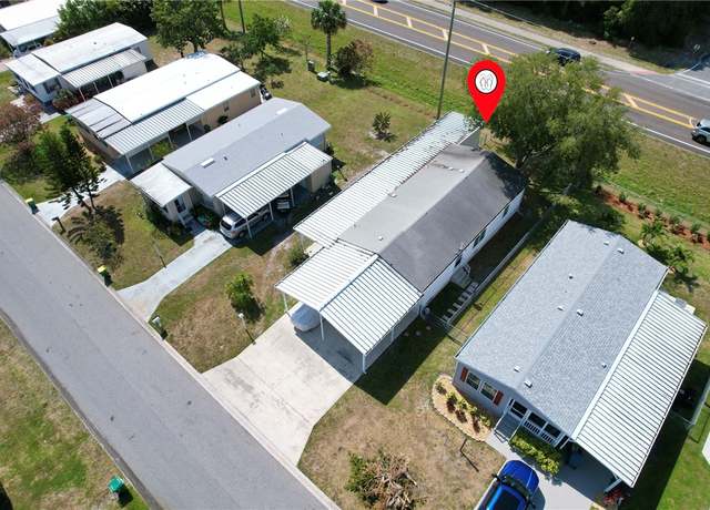 Property at 915 Vireo Dr, Barefoot Bay, FL 32976, 3 beds, 2 baths