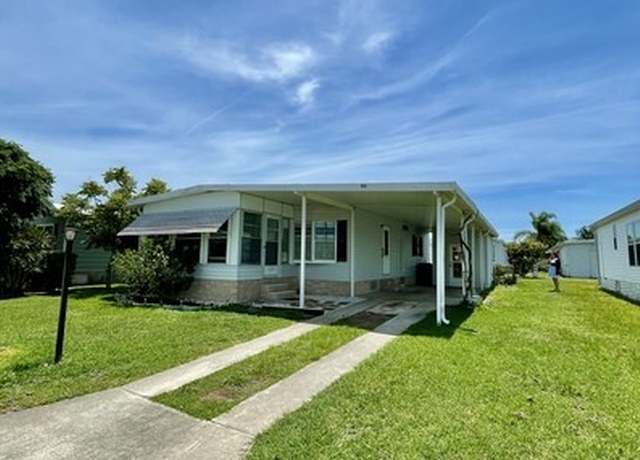 Property at 911 Oriole Cir, Barefoot Bay, FL 32976, 2 beds, 2 baths