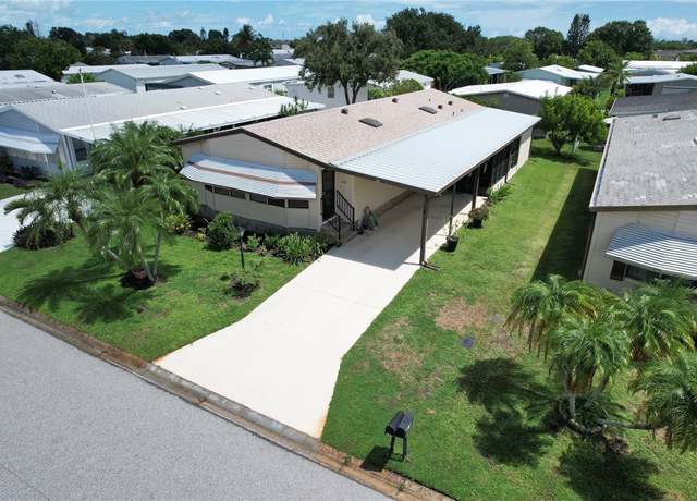 Property at 630 Periwinkle Cir, Barefoot Bay, FL 32976, 2 beds, 2 baths