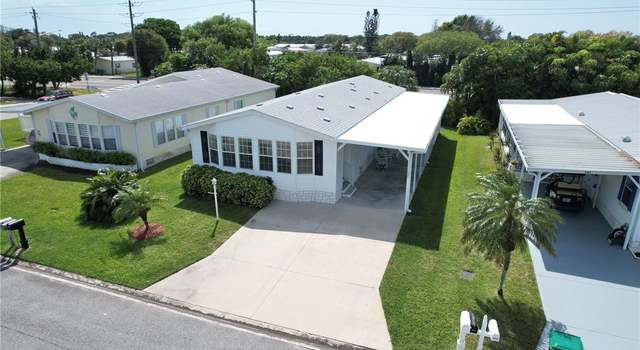 Photo of 503 Egret Cir, Barefoot Bay, FL 32976