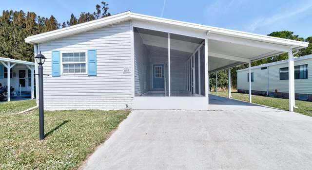 Photo of 613 Papaya Cir, Barefoot Bay, FL 32976