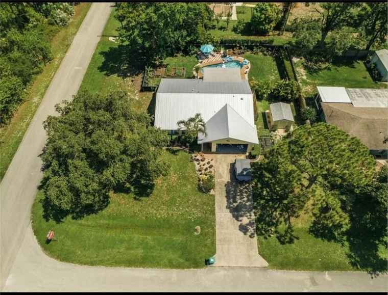 Photo of 7301 E Coquina Ave NE Fort Pierce, FL 34951
