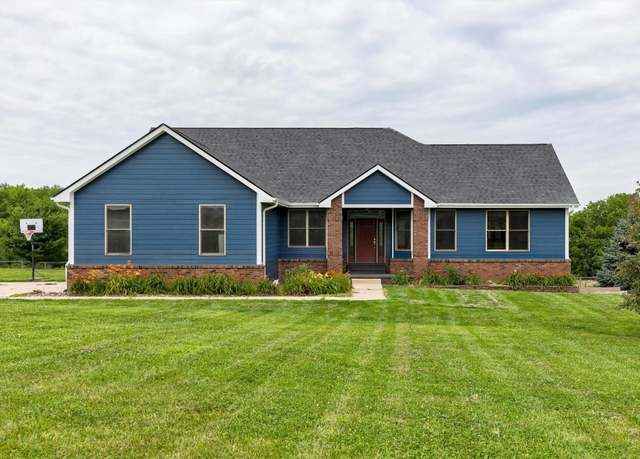 Property at 10579 W 129th St S, Prairie City, IA 50228, 5 beds, 3 baths