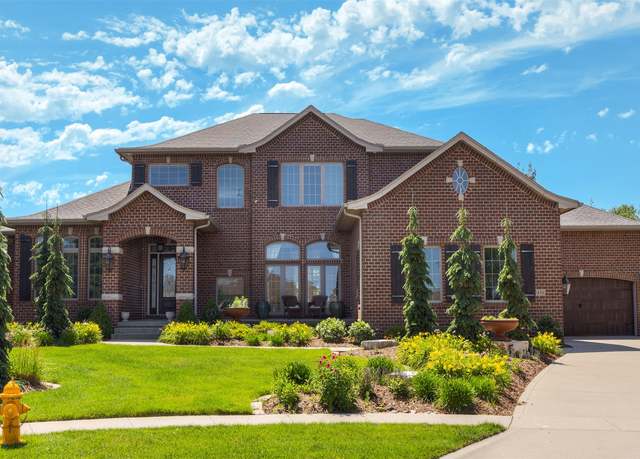 Property at 4701 150th St, Urbandale, IA 50323, 5 beds, 5.5 baths