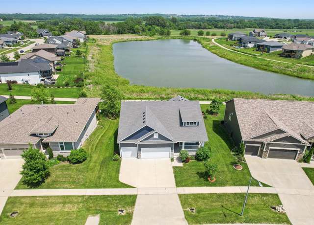 Property at 7821 NW 96th St, Johnston, IA 50131, 4 beds, 3 baths