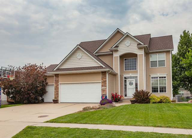Property at 4308 126th St, Urbandale, IA 50323, 4 beds, 3.5 baths
