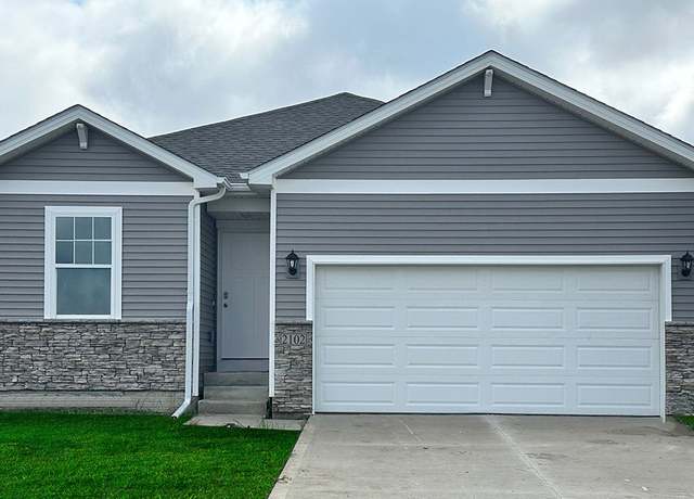 Property at 5641 153rd St, Urbandale, IA 50323, 5 beds, 3 baths
