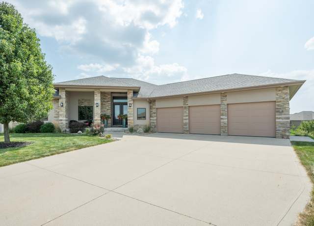 Property at 4800 143rd St, Urbandale, IA 50323, 5 beds, 3.5 baths