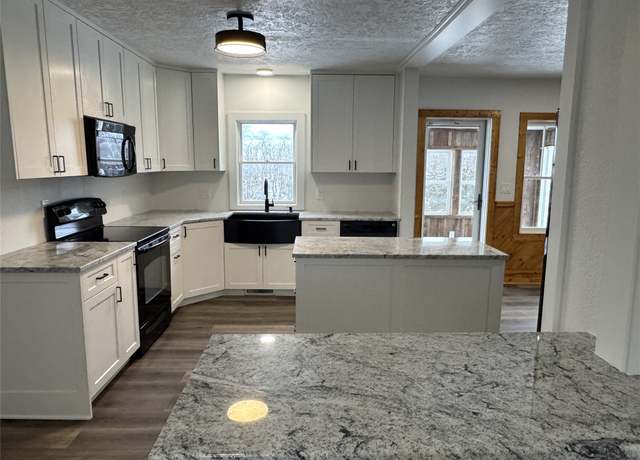 Property at 3289 260th St, Orient, IA 50858, 4 beds, 3 baths