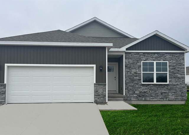 Property at 5605 152nd St, Urbandale, IA 50111, 5 beds, 3 baths
