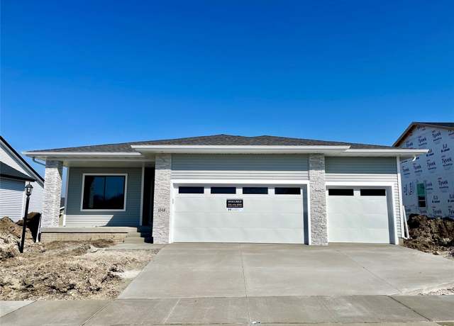 Property at 1048 NE 64th Ave, Des Moines, IA 50313, 4 beds, 3 baths