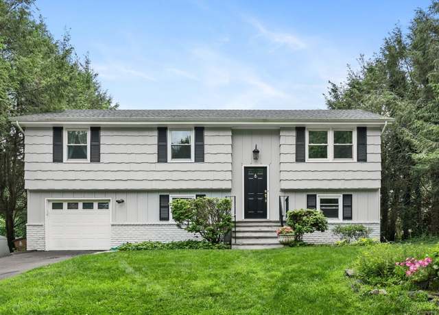 Property at 232 Woodridge Dr S, Stamford, CT 06902, 4 beds, 2 baths