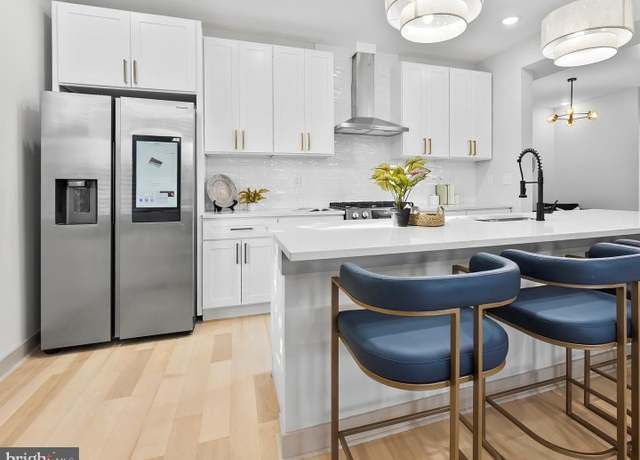 Property at 5100 Queensberry Ave, Baltimore, MD 21215, 5 beds, 4 baths