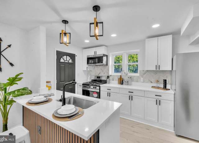 Property at 1306 E 35th St, Baltimore, MD 21218, 4 beds, 2 baths