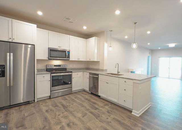 Property at 700 Mount Airy Ter NE #403, Leesburg, VA 20176, 2 beds, 2 baths