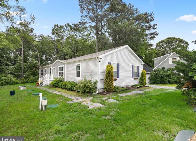 Property at 5 Lakewood Dr, Lewes, DE 19958, 4 beds, 2 baths