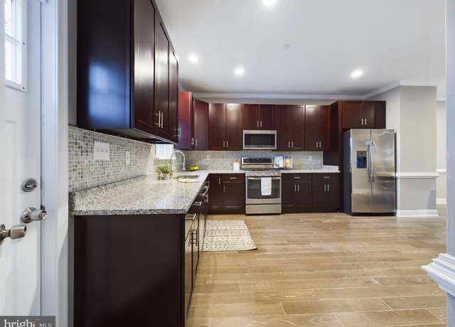 Property at 1517 E Chase St, Baltimore, MD 21213, 3 beds, 4 baths