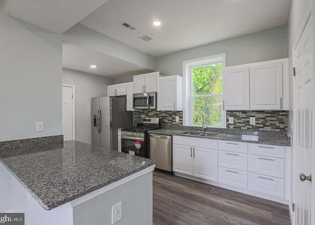 Property at 5216 Florence Ave, Baltimore, MD 21215, 6 beds, 4.5 baths