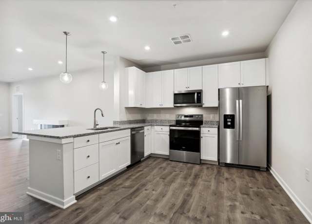 Property at 700 Mount Airy Ter NE #104, Leesburg, VA 20176, 2 beds, 2 baths