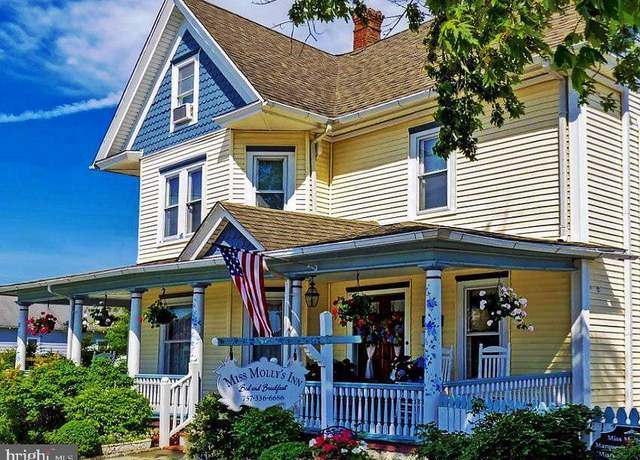 Property at 4141 Main St, Chincoteague Island, VA 23336, 7 beds, 7 baths